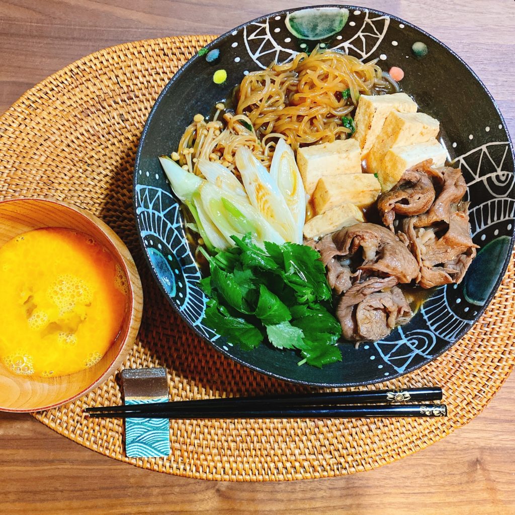 Sukiyaki dish with various garnishes